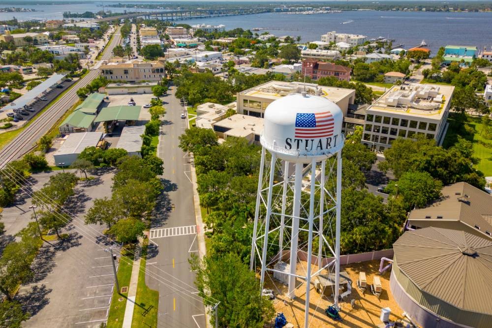 Aerial view of the water tower and town in Stuart, Florida (FL)