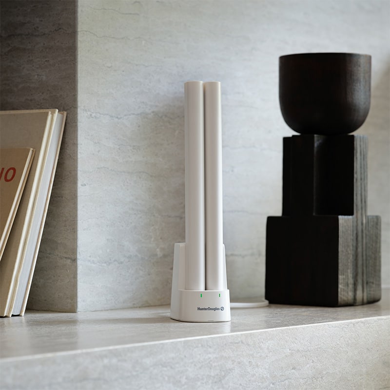 Elegant modern candle holder with white design for home decor.
