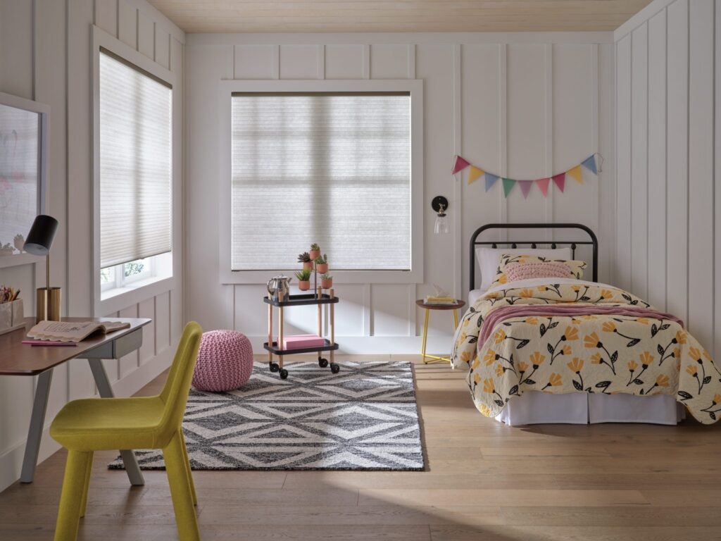 Applause® Honeycomb Shades in Vintage™ with PowerView® Automation in a nursery