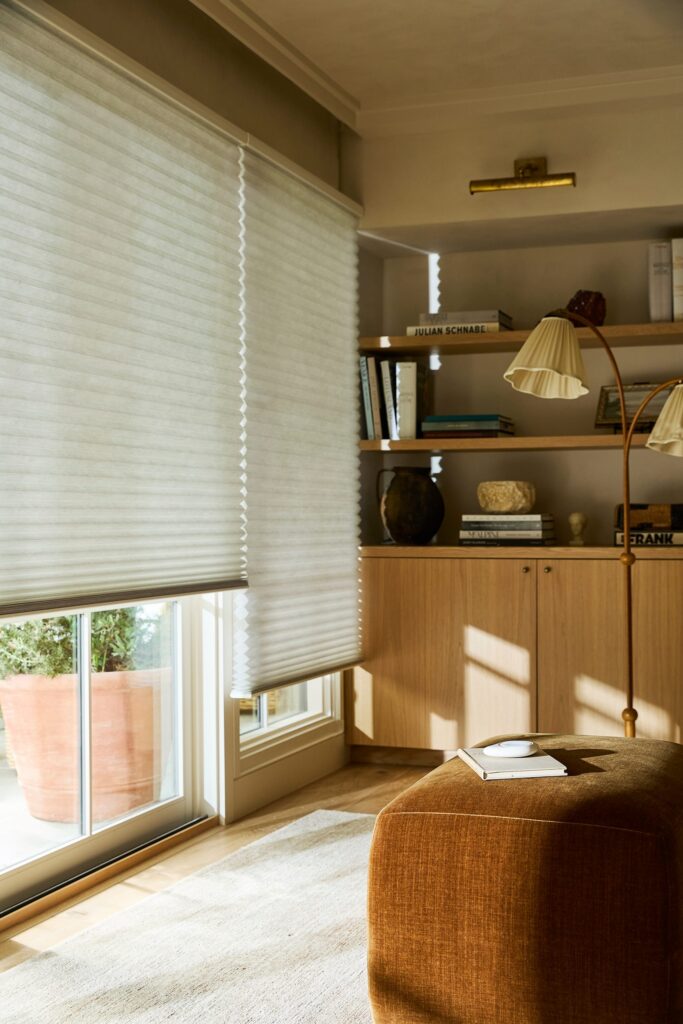 Duette® Honeycomb Shades with PowerView® Automation in a living room